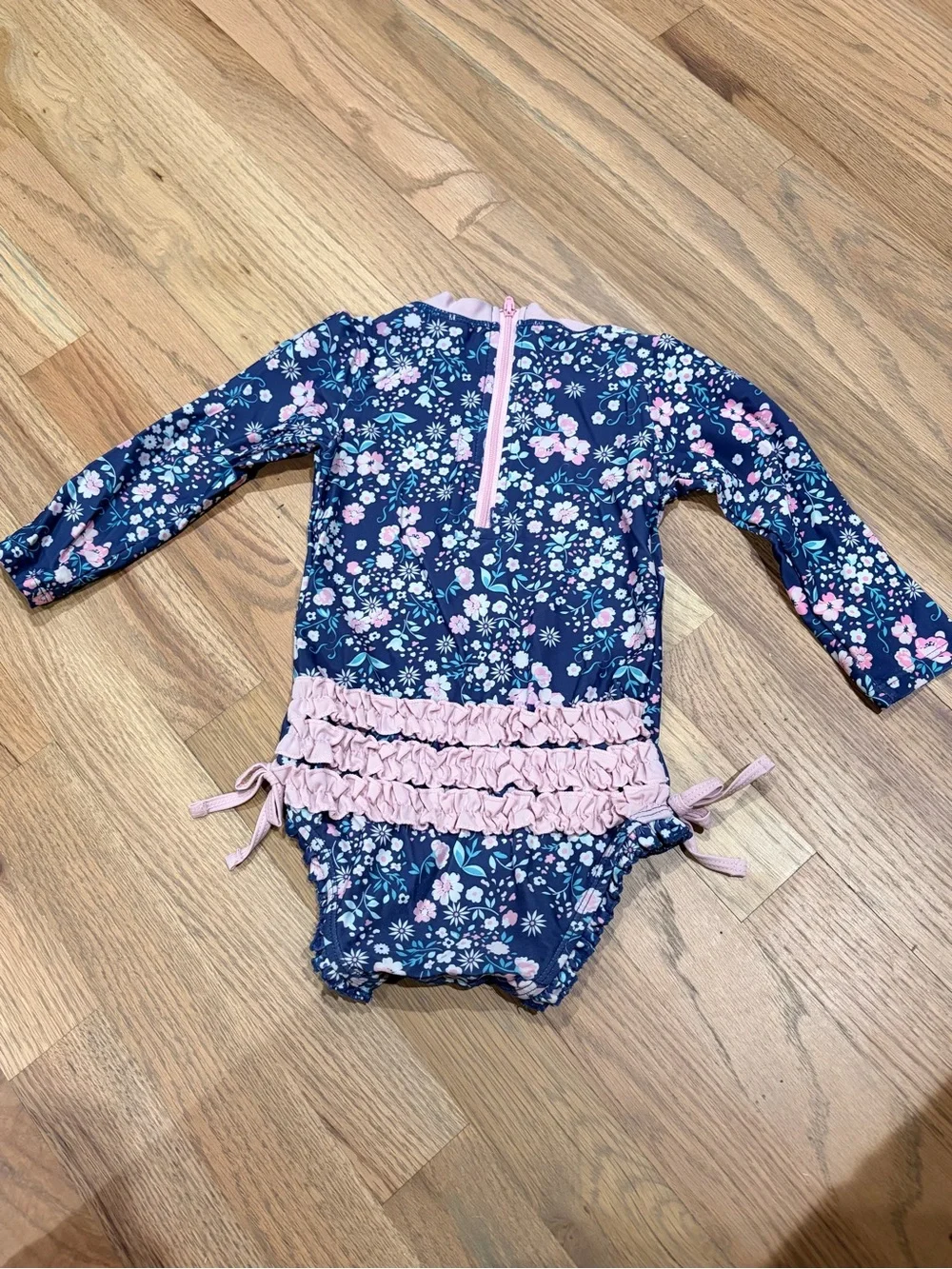 Rufflebutts toddler girl floral rashguard bathing suit with snap closure